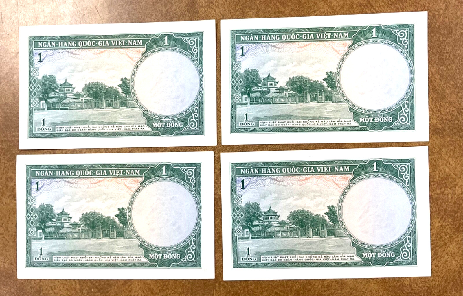 1956 Vietnam P1, 1 Dong, temple & gardens 4 consecutive serial #s.
